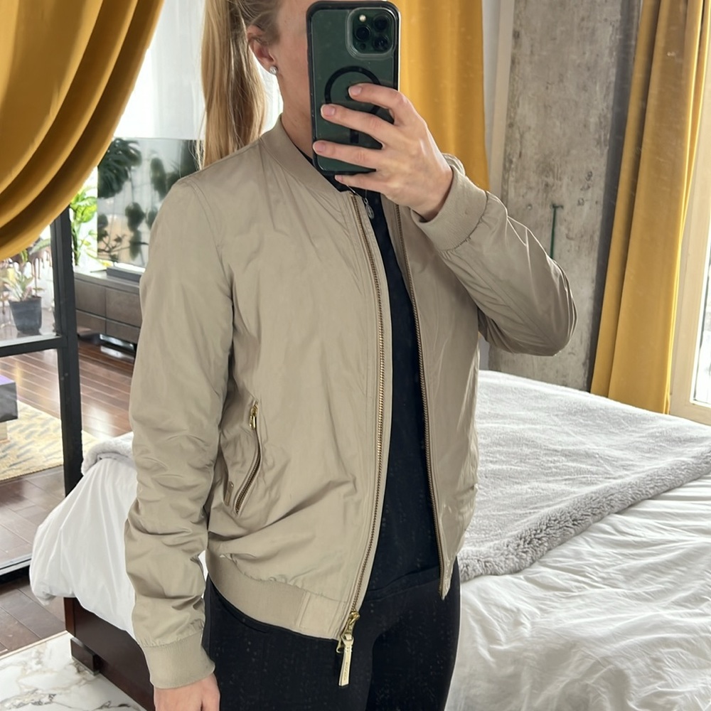 Woolrich waterproof coat in beige